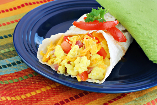 Breakfast burrito with scrambled eggs, cheese, and red peppers